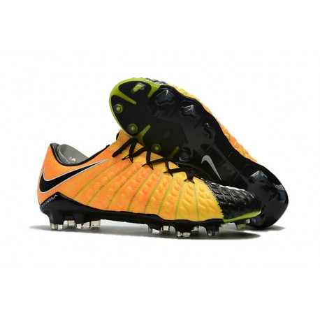 black and yellow soccer cleats