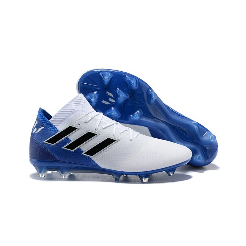 white and blue adidas cleats