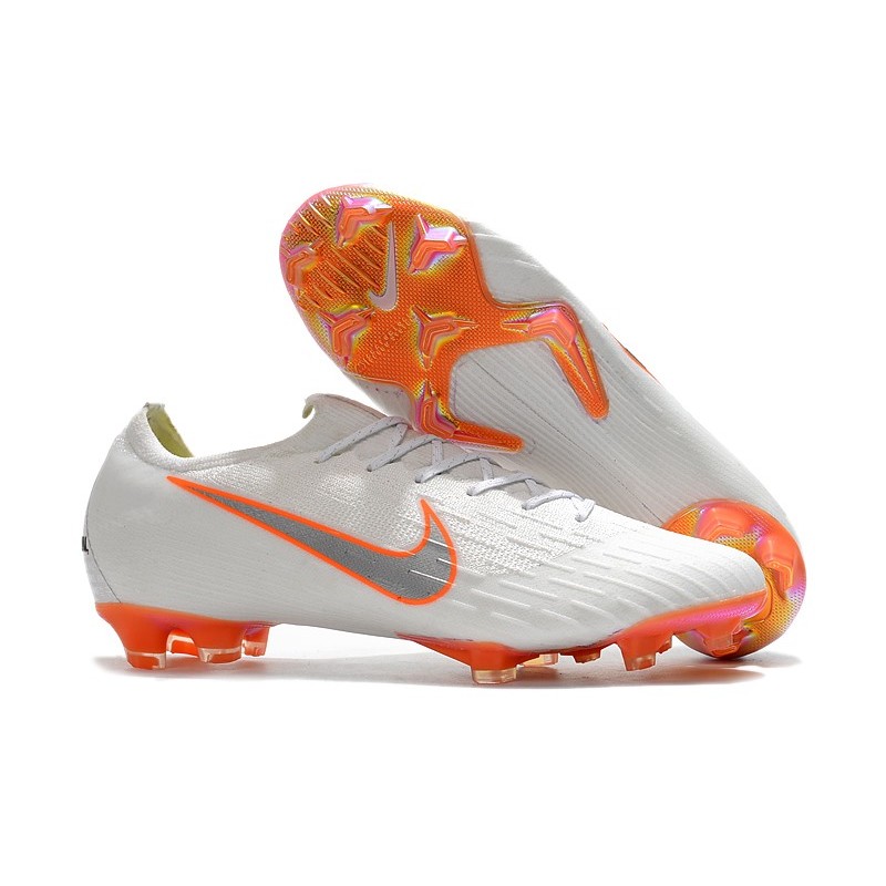 white and orange nike football boots