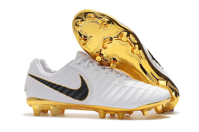 white and gold cleats
